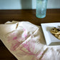 Organic Cloth Napkin handprinted with a pink Calendula Flower